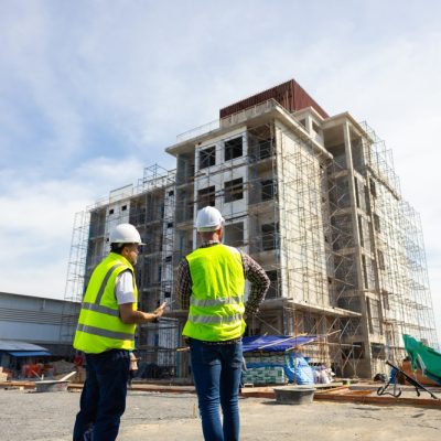 Back,View,Engineering,People,,Construction,Site.,Construction,Worker,Planning,And